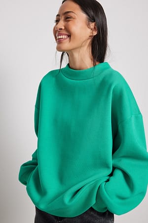 Green Sweatshirt com Pormenor de Gola Subida orgânica
