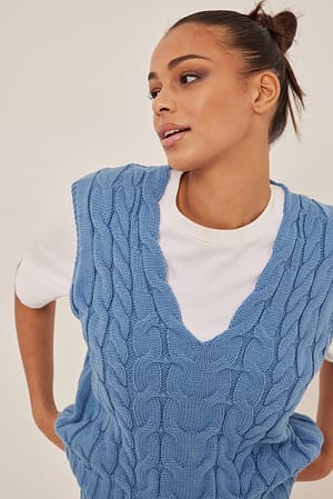 Blue Colete de malha tricotada com decote em V