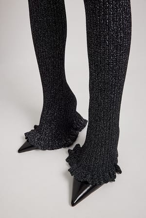 Black Kudotut leveälahkeiset housut efektikuidusta