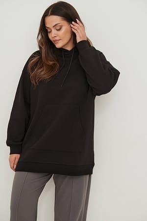 Black Lång oversize hoodie med ficka