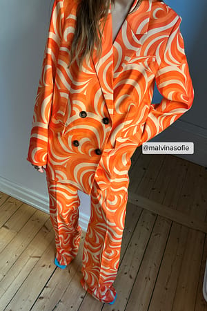 Orange Print Återvunna skräddade kostymbyxor med tryck