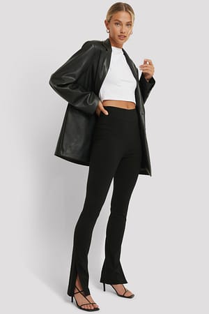 Black Pantalones superelásticos slim fit con apertura