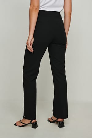 Black Resirkulerte bukser med slitte detaljer