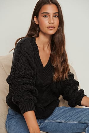 Black Kraftig kabelstrikket sweater