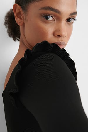 Black Frill Shoulder Knit Top